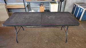 lot 70 image: Black 6 Folding Cosco Table
