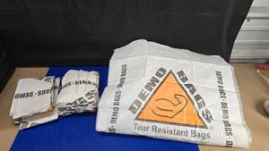 lot 90 image: Lot of 30 Demo Bags.  Bags Measure 30 x 52.  110 lb Capacity Per Bag