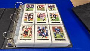 lot 119 image: Large Binder w Topps 2005 Football Cards