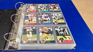 lot 122 image: Large Binder w Topps 2003 Football Cards