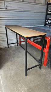 lot 153 image: Suncast Black Metal Elevated Shop Table.  Measures 6 x 39 x 20