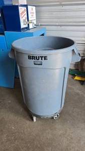 lot 163 image: Rubbermaid Commercial Brute 32 Gallon Trash Can w Rolling Base