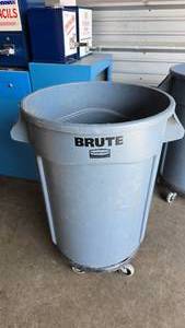 lot 164 image: Rubbermaid Commercial Brute 32 Gallon Trash Can w Rolling Base