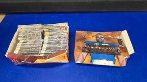 lot 230 image: 2 Boxes of Football Cards.  Includes 1996 Pacific Invincible & 1995 Pinnacle Action Packed