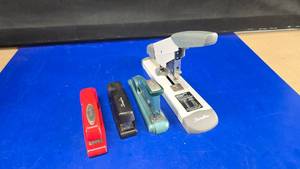 lot 251 image: Lot of 4 Swingline Staplers.  Includes the iconing red stapler & art decco Swingline Speed Stapler.  Amazing condition.