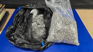 lot 262 image: Massive Trash Bag Full of Aluminum Bottle Tabs