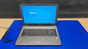 lot 287 image: HP 3165NGW Laptop w Power Cord.  Appears To Have Been Factory Reset