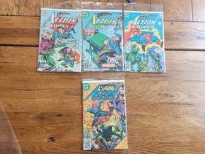 lot 3 image: Vintage selection of 4 DC comics - Superman Action Comics