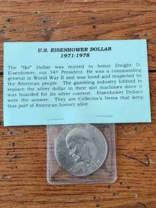 lot 129 image: 1977 Eisenhower Ike dollar coin