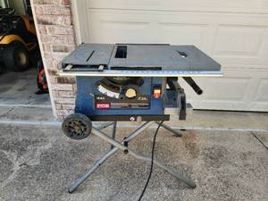 lot 76 image: Ryobi portable 10 table saw