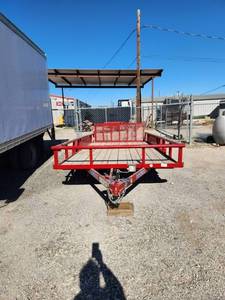 2018 Load Trail tandem axle (7000lb) frame 16' trailer with fold down ramp electric brakes - (205/75-R15)-tires are really good, wood floor great condition - overall trailer in great condition - comes with Title. Has been kept inside most of the time
