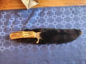 lot 101 image: Vintage Stagg handled with polished stone in handle fixed blade hunting (Bowie) knife with fur sheath - 11 long
