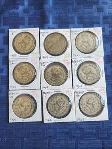lot 86 image: Selection of 9 Mexican silver dollars - 1958,59,60,61,62,63,65,66, and 1967 - Bidding x 9