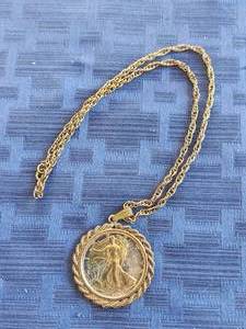 lot 164 image: 1945 2-tone walking liberty half-dollar pendant and chain