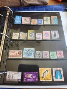 lot 184 image: Binder and 3 books containing a vintage stamp collection