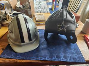 lot 102 image: Dallas Cowboys hard hat and Dallas Cowboys replica leather helmet
