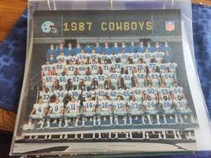 lot 71 image: Generous selection of Dallas Cowboy team pictures in a binder