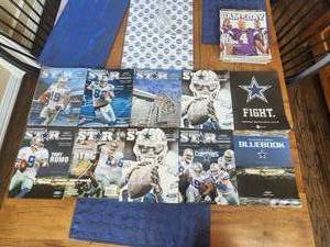 lot 138 image: Selection of Dallas Cowboys programs - Dallas Star, Bluebook, Gameday