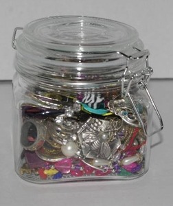 lot 1 image: Jar of jewelry