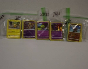 lot 28 image: 100 OFFICIALLY LICENSED POKEMON CARDSMYSTERY PACKS