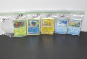 lot 49 image: 100 Official Pokemon Cards-Mystery Packs