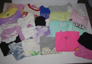 lot 61 image: Girls size 67 shirts