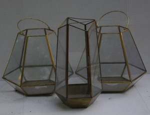 lot 57 image: Geometric brass trimmed lanterns