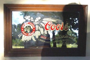 lot 100 image: Coors commerating bi-centennial wood framed mirror