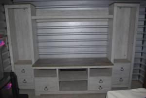 lot 125 image: Home entertainment furniture with lighting in the end pieces