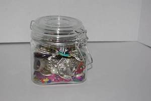 lot 1 image: Jar of jewelry
