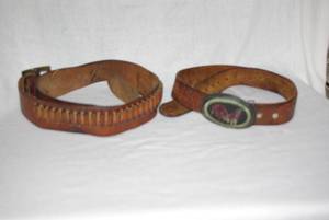 lot 208 image: 2 vintage western leather belts one belt contains bullets and other belt contains buckle