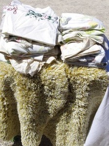 lot 234 image: Vintage linens and bath rugs