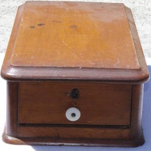 lot 247 image: Antique wooden storage drawer with porcelain knob and keyhole
