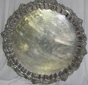 lot 253 image: Vintage round silver-plated serving tray