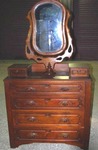 !!EASTLAKE!! Victorian carved walnut stepback dresser featuring top glovebox drawers and and ornate swivel mirror