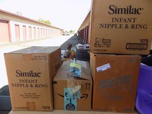 lot 169 image: Baby bottles and rings