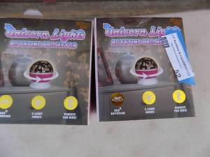 lot 52 image: Unicorn lights rotating projector  NIB x 2
