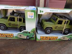 lot 228 image: Dinosaur rescue team jeeps  x2 NIP