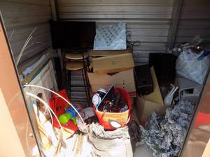 lot 258 image: Storage unit (LEIN) 5x10 Baby Gate, home and Holiday decor, bikes, baby mattress, plus