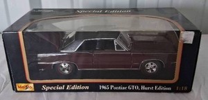 lot 14 image: Maisto Special Edition 118 Scale 1965 Pontiac GTO Hurst Edition