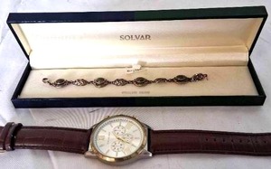 lot 26 image: Solvar .925 Sterling Silver Bracelet and Van Heusen Wrist Watch---Watch not working