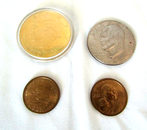 lot 506 image: 1972 Ike dollar, Sacajawea dollars (2), Trump commemorative gold clad dollar