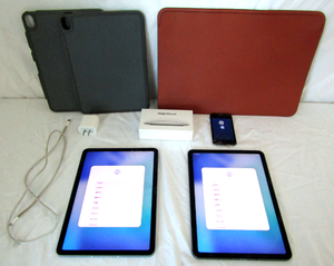 Apple iPads model A2324 (2) one is locked one is not (1 has cracked screen), Vintage Apple iPod (cracked screen) plus hard case protectors and an Apple leather carry case plus. (BID IS TIMES THE QUANTITY OF 2)