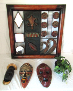 lot 529 image: Metal wall art, African tribal masks, and an artificial plant