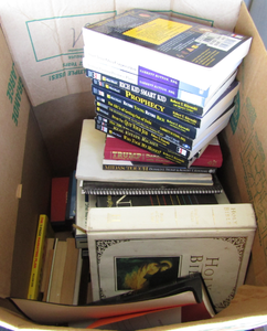 lot 601 image: Box full of books including an autographed copy of a Robert Kiyosaki Rich Dad Poor Dad series book