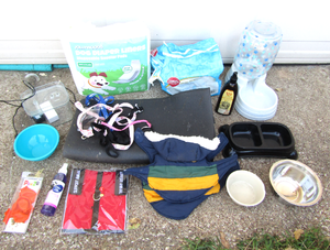 lot 592 image: Assorted dog supplies as shown