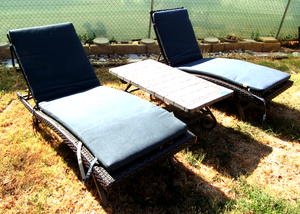 lot 625 image: Chaise lounge chairs with cushions and matching table