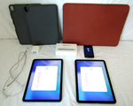 Apple iPads model A2324 (2) one is locked one is not (1 has cracked screen), Vintage Apple iPod (cracked screen) plus hard case protectors and an Apple leather carry case plus. (BID IS TIMES THE QUANTITY OF 2)