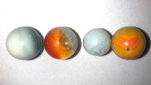 lot 23 image: LOT OF 4 OLD VINTAGE MULTICOLOR GLASS MARBLES  ORANGE, YELLOW & PALE BLUE