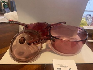 lot 66 image: Vintage Corning Visions Cranberry Glass Cookware Lot